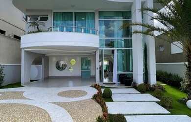 Imagem: A casa em condomínio possui 4 Dormitórios, 5 Banheiros, 4