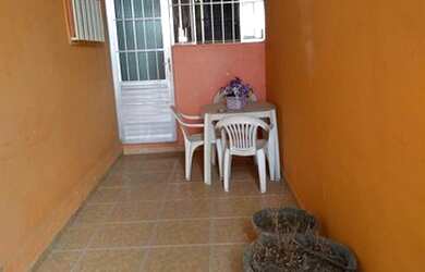 Imagem: A casa possui 3 Dormitórios, 4 Banheiros, 2 Vagas na garagem