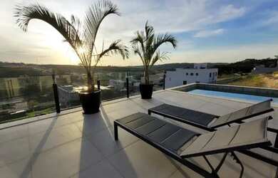 Imagem: A casa em condomínio possui 4 Dormitórios, 5 Banheiros, 4