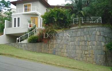 Imagem: A casa em condomínio possui 3 Dormitórios, 2 Banheiros, 5