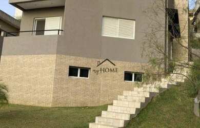 Imagem: A casa em condomínio possui 4 Dormitórios, 5 Banheiros, 4