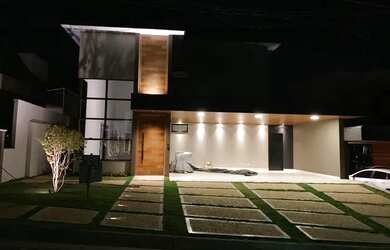 Imagem: A casa possui 4 Dormitórios, 5 Banheiros, 5 Vagas na garagem