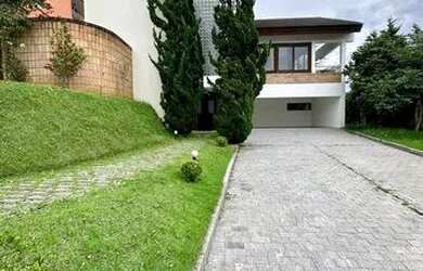 Imagem: A casa em condomínio possui 4 Dormitórios, 5 Banheiros, 5