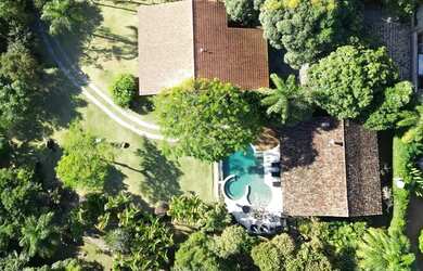 Imagem: A casa possui 5 Dormitórios, 5 Banheiros, 5 Vagas na garagem