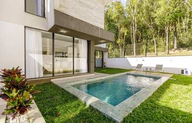 Imagem: A casa em condomínio possui 4 Dormitórios, 5 Banheiros, 4