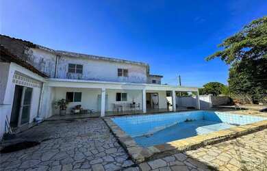 Imagem: A casa possui 4 Dormitórios, 3 Banheiros, 3 Vagas na garagem