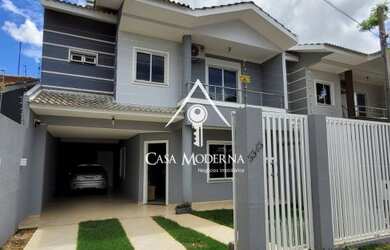 Imagem: A casa possui 2 Dormitórios, 2 Banheiros, 3 Vagas na garagem