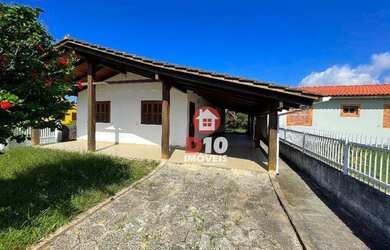 Imagem: A casa possui 2 Dormitórios, 1 Banheiro, 1 Vaga na garagem