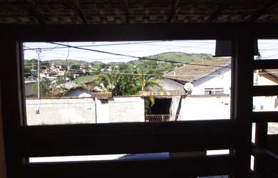 Imagem: A casa possui 2 Dormitórios, 1 Banheiro, 1 Vaga na garagem