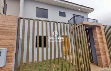 Imagem: A casa possui 3 Dormitórios, 2 Banheiros, 2 Vagas na garagem