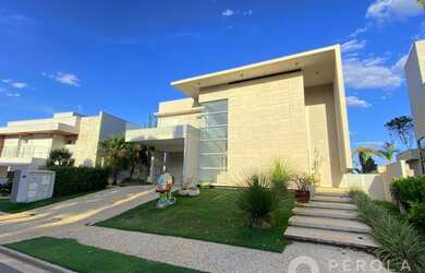 Imagem: A casa em condomínio possui 4 Dormitórios, 5 Banheiros, 4