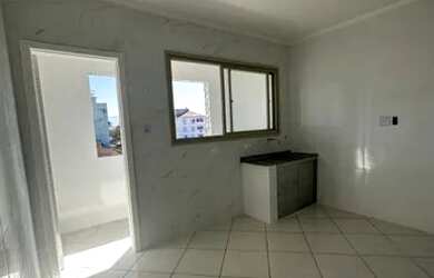 Imagem: O apartamento possui 1 Dormitório, 1 Banheiro, 1 Vaga na garagem