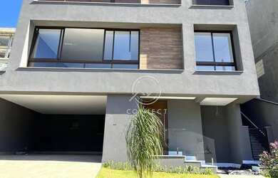 Imagem: A casa em condomínio possui 4 Dormitórios, 5 Banheiros, 4