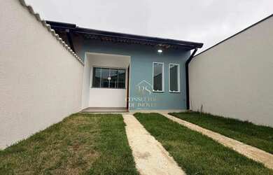 Imagem: A casa possui 3 Dormitórios, 2 Banheiros, 2 Vagas na garagem