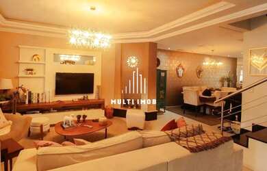 Imagem: A casa possui 4 Dormitórios, 4 Banheiros, 4 Vagas na garagem