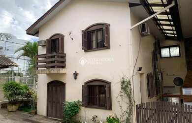 Imagem: A casa em condomínio possui 3 Dormitórios, 3 Banheiros, 99m²