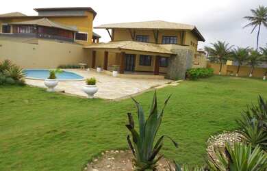 Imagem: A casa possui 5 Dormitórios, 5 Banheiros, 3 Vagas na garagem