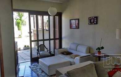 Imagem: A casa possui 3 Dormitórios, 3 Banheiros, 3 Vagas na garagem