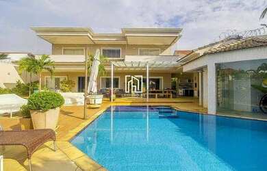 Imagem: A casa em condomínio à venda possui 5 Dormitórios, 5 Banheiros