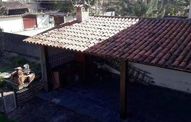 Imagem: A casa possui 4 Dormitórios, 3 Banheiros, 5 Vagas na garagem