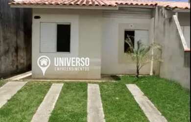 Imagem: A casa possui 2 Dormitórios, 1 Banheiro, 2 Vagas na garagem