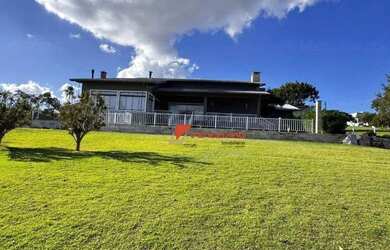 Imagem: A casa em condomínio possui 4 Dormitórios, 5 Banheiros, 5