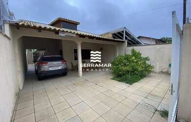 Imagem: A casa possui 4 Dormitórios, 2 Banheiros, 4 Vagas na garagem