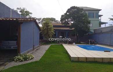 Imagem: A casa possui 2 Dormitórios, 3 Banheiros, 4 Vagas na garagem