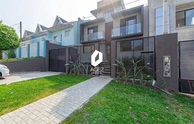 Imagem: A casa possui 3 Dormitórios, 4 Banheiros, 3 Vagas na garagem