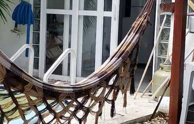 Imagem: A casa possui 4 Dormitórios, 4 Banheiros, 2 Vagas na garagem