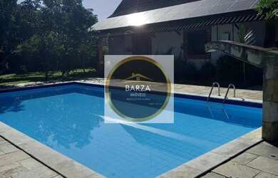 Imagem: A casa possui 5 Dormitórios, 5 Banheiros, 5 Vagas na garagem