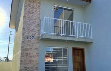 Imagem: A casa possui 2 Dormitórios, 2 Banheiros, 2 Vagas na garagem