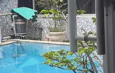 Imagem: A casa possui 5 Dormitórios, 4 Banheiros, 3 Vagas na garagem