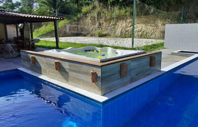 Imagem: A casa para temporada possui 5 Dormitórios e 5 Vagas na garagem