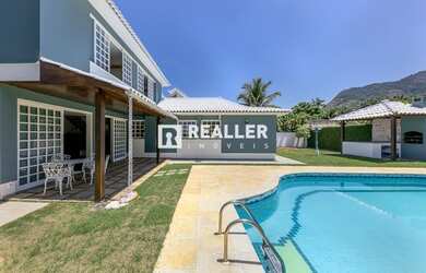 Imagem: A casa em condomínio possui 4 Dormitórios, 3 Banheiros, 2