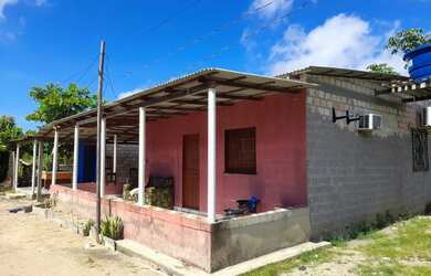 Imagem: A casa possui 2 Dormitórios, 1 Banheiro, 1 Vaga na garagem