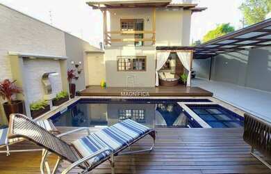 Imagem: A casa possui 4 Dormitórios, 5 Banheiros, 5 Vagas na garagem