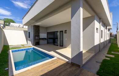 Imagem: A casa possui 3 Dormitórios, 4 Banheiros, 4 Vagas na garagem