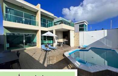 Imagem: A casa possui 4 Dormitórios e 3 Vagas na garagem e está localizado