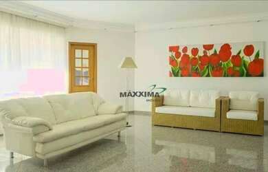 Imagem: A casa possui 4 Dormitórios, 5 Banheiros, 5 Vagas na garagem