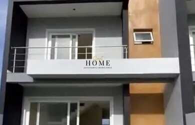 Imagem: A casa possui 3 Dormitórios, 2 Banheiros, 1 Vaga na garagem