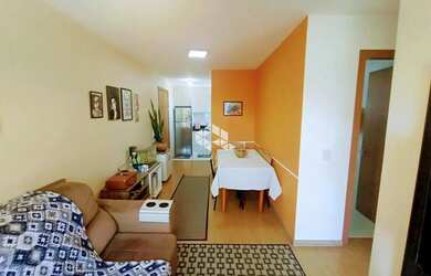 Imagem: O apartamento possui 2 Dormitórios, 1 Banheiro, 1 Vaga na garagem