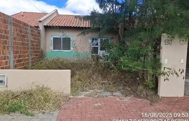 Imagem: A casa possui 2 Dormitórios, 1 Banheiro, 1 Vaga na garagem