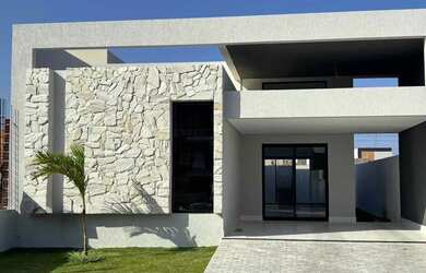 Imagem: A casa em condomínio e possui 3 Dormitórios, Suítes, 4 Banheiros