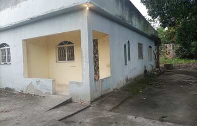 Imagem: A casa possui 3 Dormitórios e 1 Banheiro e está localizado