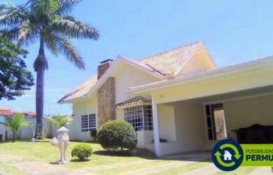 Imagem: A casa em condomínio à venda possui 4 Dormitórios, 4 Banheiros