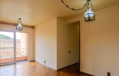 Imagem: O apartamento possui 3 Dormitórios, 1 Banheiro, 1 Vaga na garagem