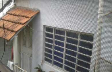 Imagem 10: Dois quartos, uma suite e edicula superior e embaixo nos fundos com lavanderia....