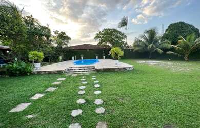 Imagem: A casa possui 3 Dormitórios, 5 Vagas na garagem e está localizado