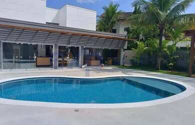 Imagem: A casa possui 4 Dormitórios, 5 Banheiros, 3 Vagas na garagem